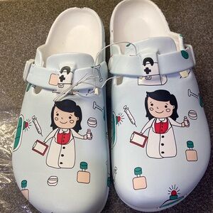 NWT Light Blue Nurse Print Clogs. More for around home than work. Size 9.5 to 10